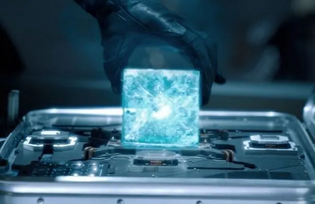 Realistic, cinematic visualization of the Tesseract glowing on a S.H.I.E.L.D. terminal during the events of MCU Phase 1: The Infinity Path.
